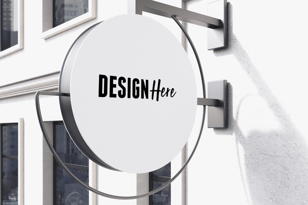 Circular sign with 'DESIGN Hub' on a modern wall mount.